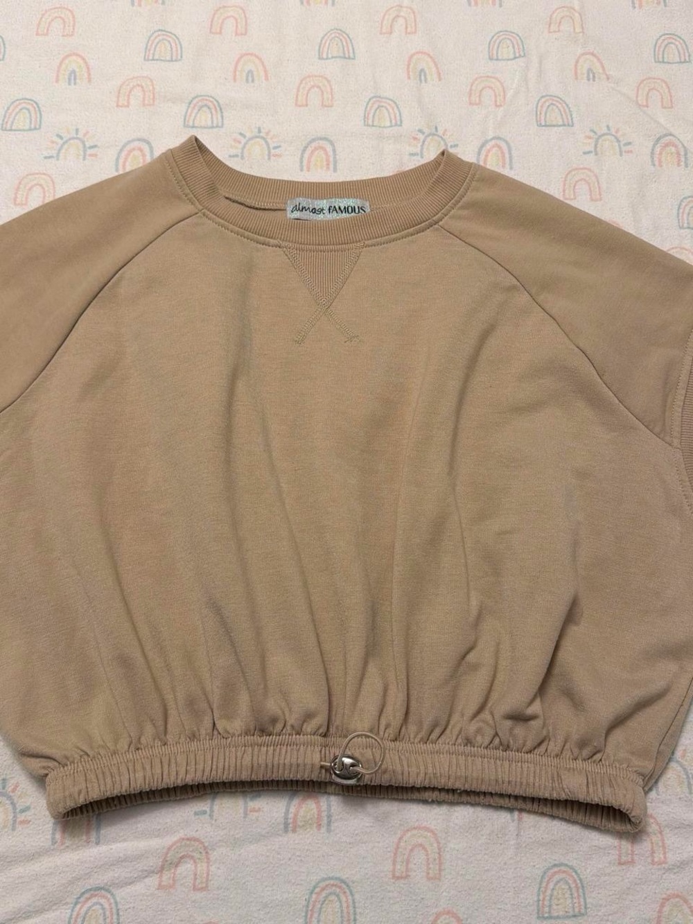 Almost Famous Cropped Crewneck Sweatshirt in Tan